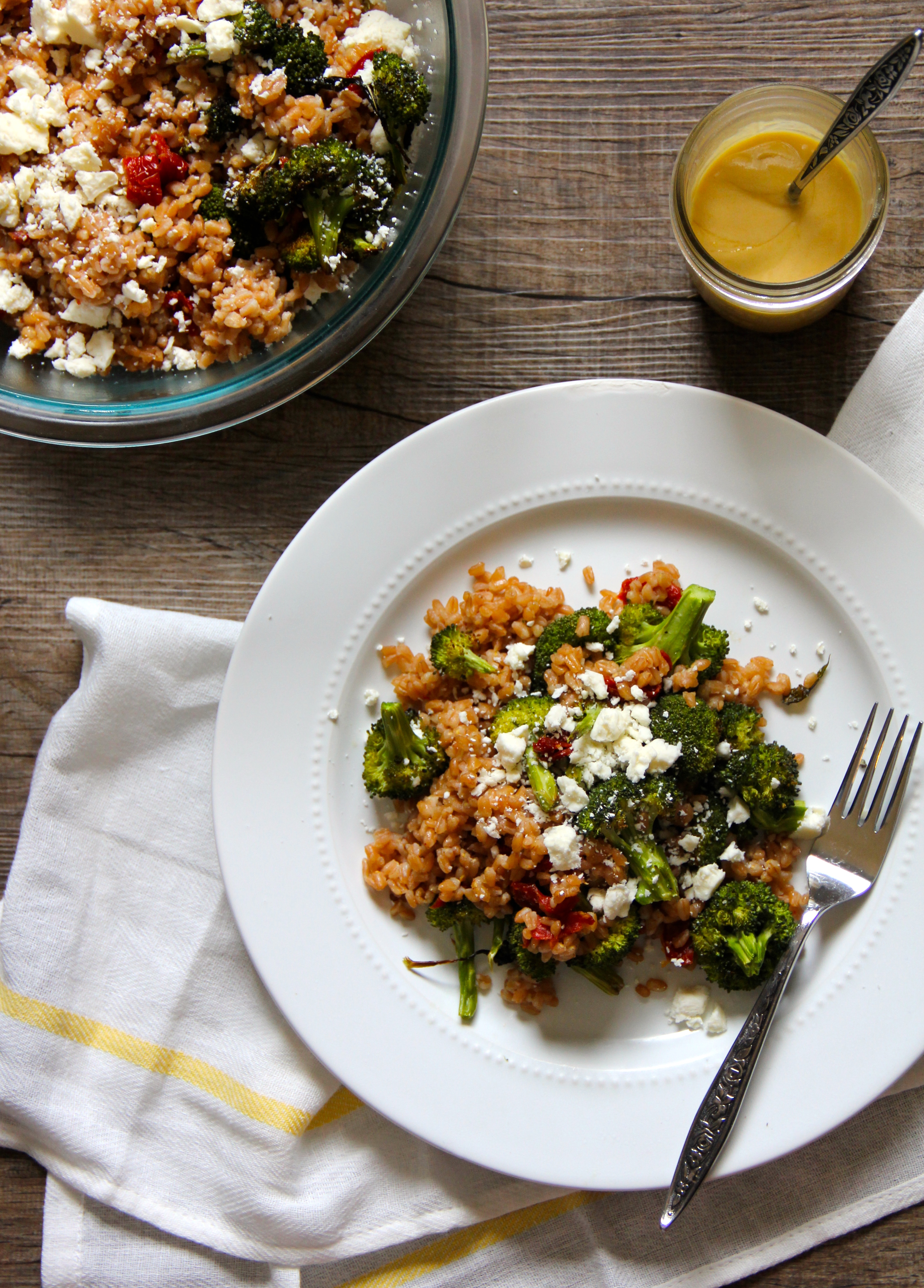 Roasted Broccoli with Sun Dried Tomatoes, Farro, Feta and Tahini